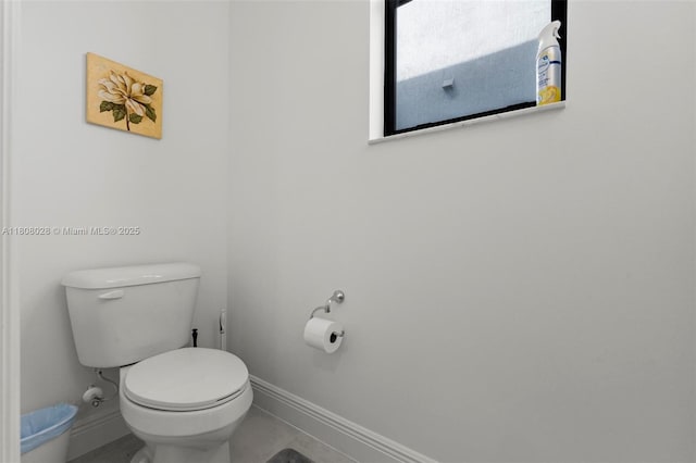 16450 Sea Turtle Pl, Loxahatchee, FL 33470 - bathroom featuring toilet and baseboards