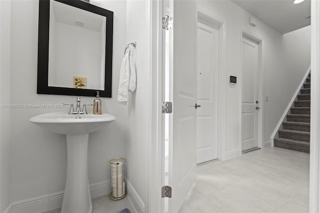 16450 Sea Turtle Pl, Loxahatchee, FL 33470 - bathroom with a sink and baseboards
