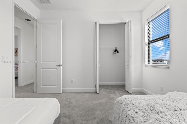 16450 Sea Turtle Pl, Loxahatchee, FL 33470 - bedroom with carpet, a closet, and baseboards