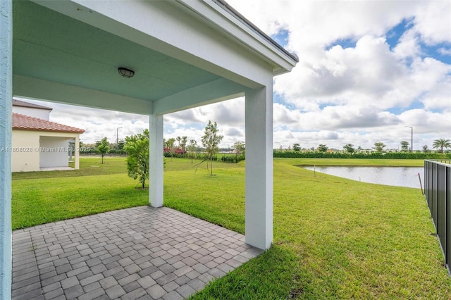 16450 Sea Turtle Pl, Loxahatchee, FL 33470 - view of green lawn with a water view