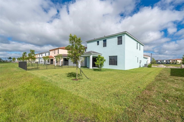 16450 Sea Turtle Pl, Loxahatchee, FL 33470 - back of house featuring stucco siding and cooling unit