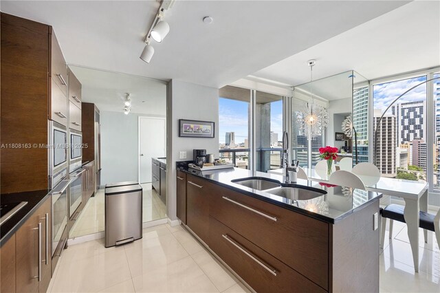 485 Brickell Ave Unit 1604, Miami, FL 33131 - bedroom with wallpapered walls and baseboards