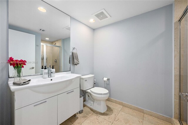 485 Brickell Ave Unit 1604, Miami, FL 33131 - bathroom featuring a shower stall, tile patterned floors, and baseboards