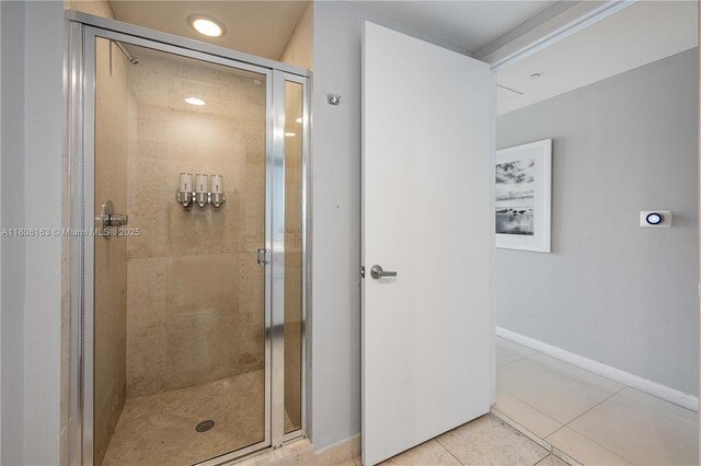 485 Brickell Ave Unit 1604, Miami, FL 33131 - foyer entrance featuring electric panel, baseboards, and light tile patterned floors