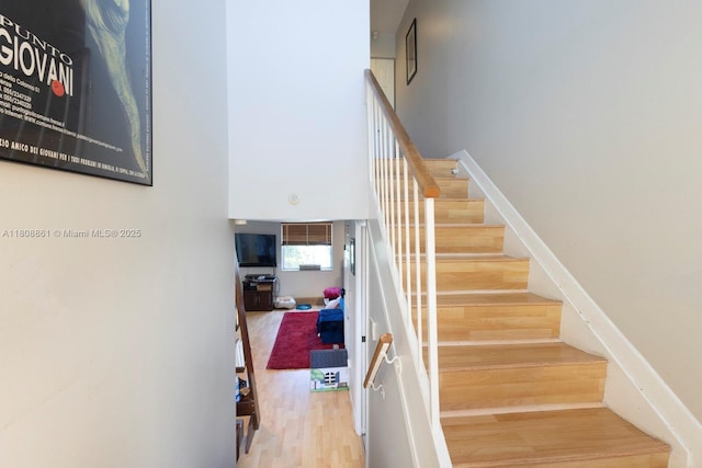 6870 SW 45th Ln Unit 8, Miami, FL 33155 - stairway with a high ceiling and wood finished floors