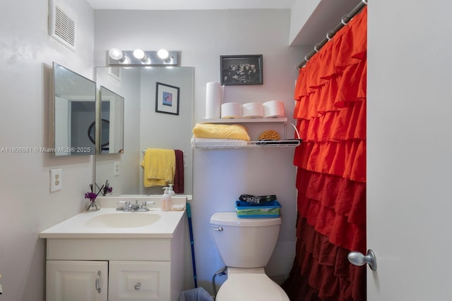 6870 SW 45th Ln Unit 8, Miami, FL 33155 - bathroom featuring vanity, toilet, and curtained shower