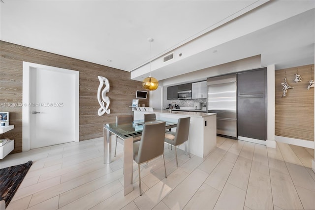 55 SE 6th St Unit 2803, Miami, FL 33131 - dining area featuring wooden walls