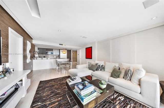 55 SE 6th St Unit 2803, Miami, FL 33131 - living room featuring light wood-style flooring