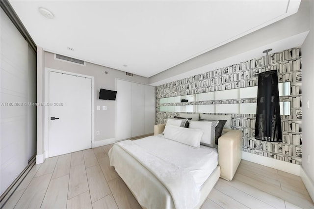 55 SE 6th St Unit 2803, Miami, FL 33131 - bedroom with wood finished floors
