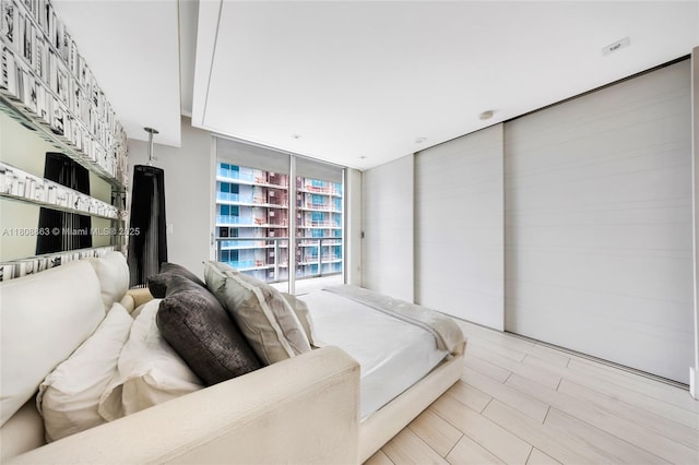 55 SE 6th St Unit 2803, Miami, FL 33131 - bedroom featuring expansive windows