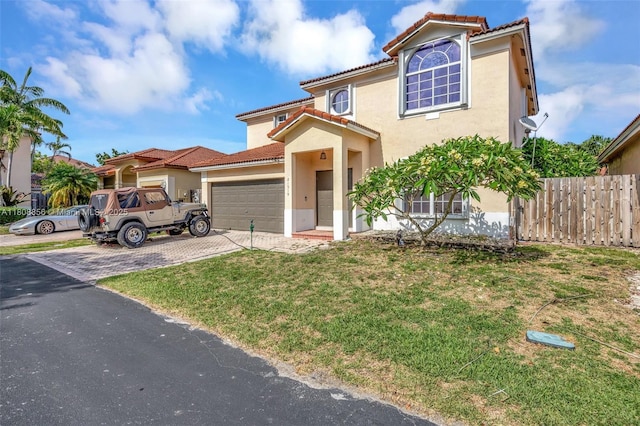 21519 SW 90th Ave, Cutler Bay, FL 33189 - view of front of house with stucco siding, a tiled roof, driveway, and an attached garage