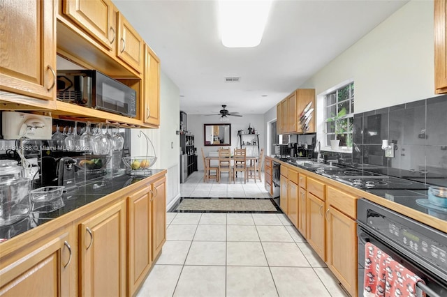 21519 SW 90th Ave, Cutler Bay, FL 33189 - kitchen featuring black appliances, backsplash, a sink, light tile patterned floors, and a ceiling fan
