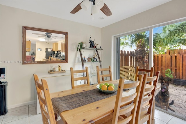21519 SW 90th Ave, Cutler Bay, FL 33189 - dining room with ceiling fan, light tile patterned floors, and baseboards