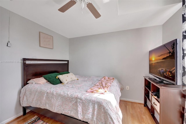 21519 SW 90th Ave, Cutler Bay, FL 33189 - bedroom with light wood-style flooring, baseboards, and a ceiling fan