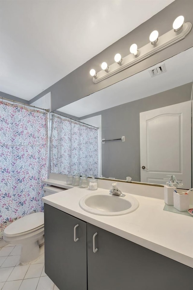 21519 SW 90th Ave, Cutler Bay, FL 33189 - bathroom featuring vanity, toilet, tile patterned flooring, and curtained shower