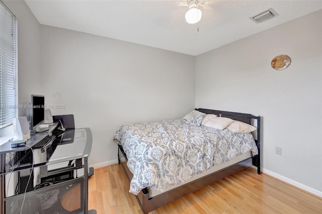 21519 SW 90th Ave, Cutler Bay, FL 33189 - bedroom featuring wood finished floors, baseboards, a desk, and ceiling fan