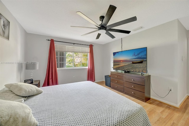 21519 SW 90th Ave, Cutler Bay, FL 33189 - bedroom featuring light wood-type flooring, baseboards, and a ceiling fan