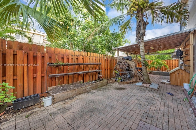 21519 SW 90th Ave, Cutler Bay, FL 33189 - fenced backyard with a patio