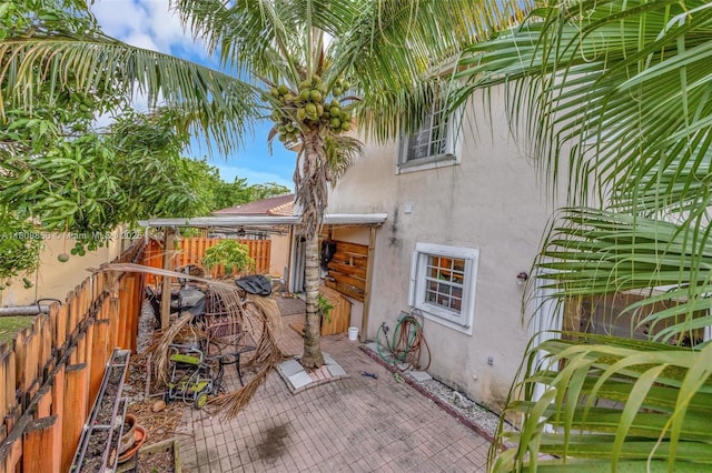 21519 SW 90th Ave, Cutler Bay, FL 33189 - view of exterior entry featuring stucco siding