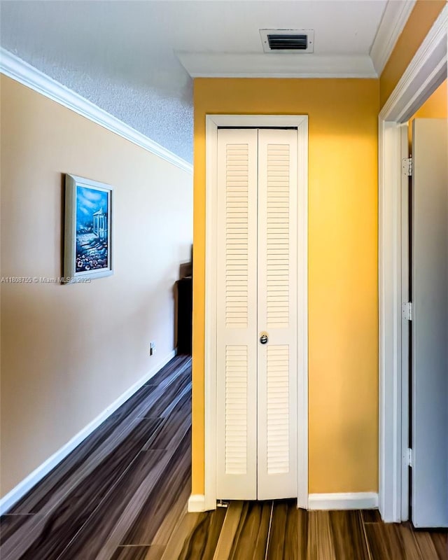 10198 Dovewood Ln Unit A, Boynton Beach, FL 33436 - hall with dark wood-style floors, ornamental molding, and baseboards