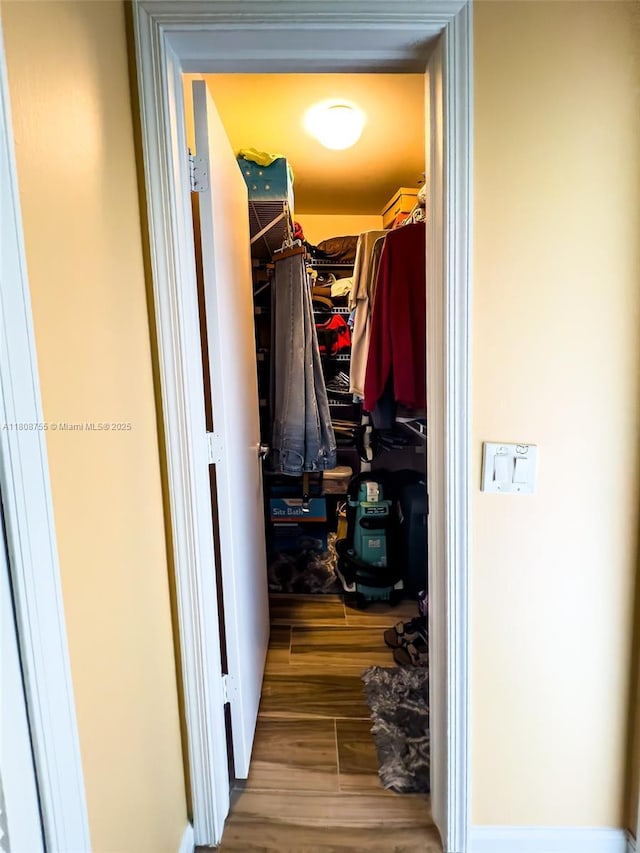 10198 Dovewood Ln Unit A, Boynton Beach, FL 33436 - spacious closet with wood finished floors