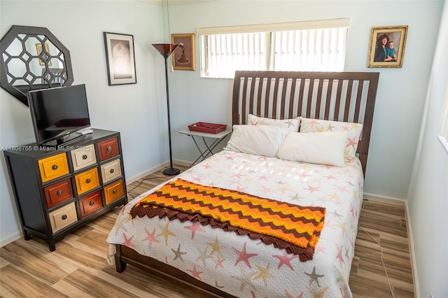 10198 Dovewood Ln Unit A, Boynton Beach, FL 33436 - bedroom featuring baseboards and light wood finished floors