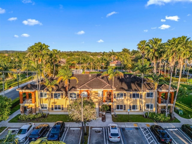 945 NE 34th Ave Unit 103, Homestead, FL 33033 - view of property featuring uncovered parking