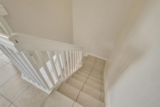 8199 W 36th Ave Unit 5, Hialeah, FL 33018 - stairway featuring tile patterned flooring