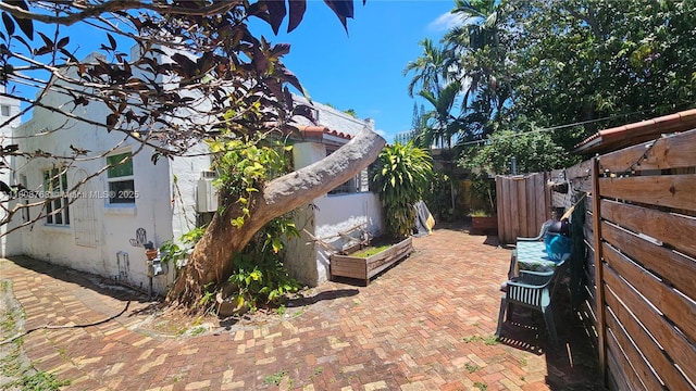 444 SW 26th Rd, Miami, FL 33129 - fenced backyard with a patio