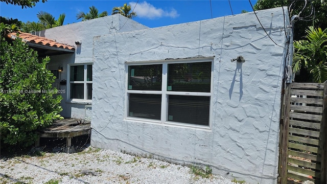 444 SW 26th Rd, Miami, FL 33129 - view of side of home with stucco siding
