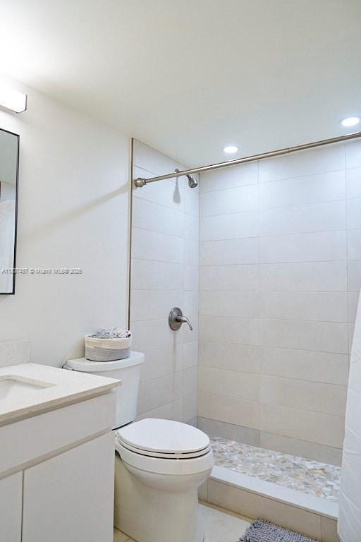 20105 NE 3rd Ct Unit 9, Miami, FL 33179 - full bath featuring vanity, tiled shower, and recessed lighting