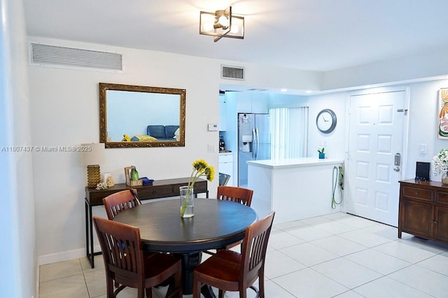 20105 NE 3rd Ct Unit 9, Miami, FL 33179 - dining room featuring light tile patterned floors