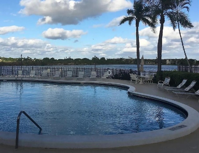 20105 NE 3rd Ct Unit 9, Miami, FL 33179 - community pool featuring a patio area and a water view
