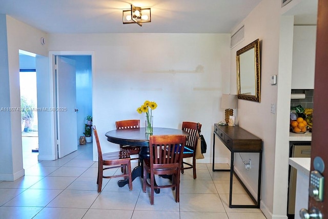 20105 NE 3rd Ct Unit 9, Miami, FL 33179 - dining room featuring baseboards and light tile patterned floors