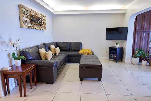 20105 NE 3rd Ct Unit 9, Miami, FL 33179 - living room featuring light tile patterned floors and baseboards