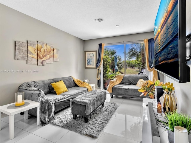 3502 NW 13th St, Lauderhill, FL 33311 - tiled living area with a textured ceiling