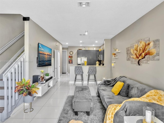 3502 NW 13th St, Lauderhill, FL 33311 - living room with stairs, light tile patterned floors, and recessed lighting
