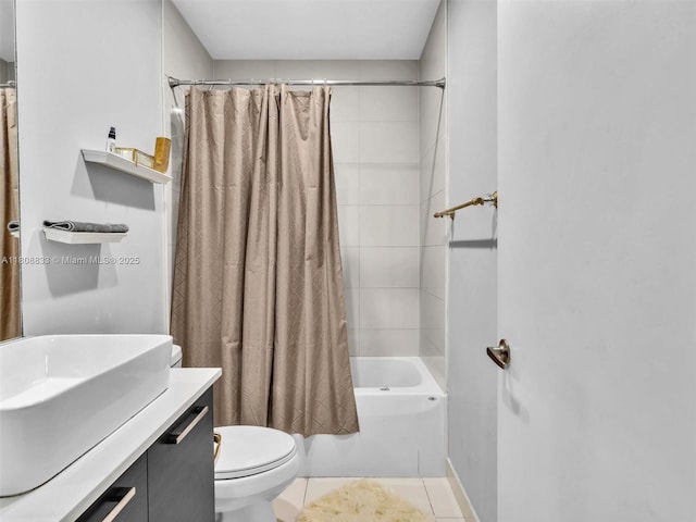 3502 NW 13th St, Lauderhill, FL 33311 - bathroom featuring toilet, vanity, shower / bath combo, and tile patterned floors