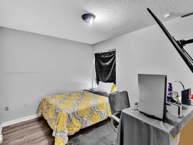 3502 NW 13th St, Lauderhill, FL 33311 - bedroom featuring wood finished floors and a textured ceiling