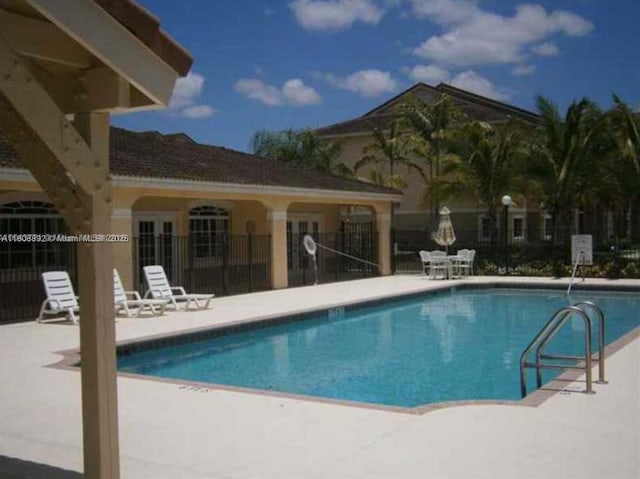 15480 SW 284th St Unit 2304, Homestead, FL 33033 - community pool featuring a patio