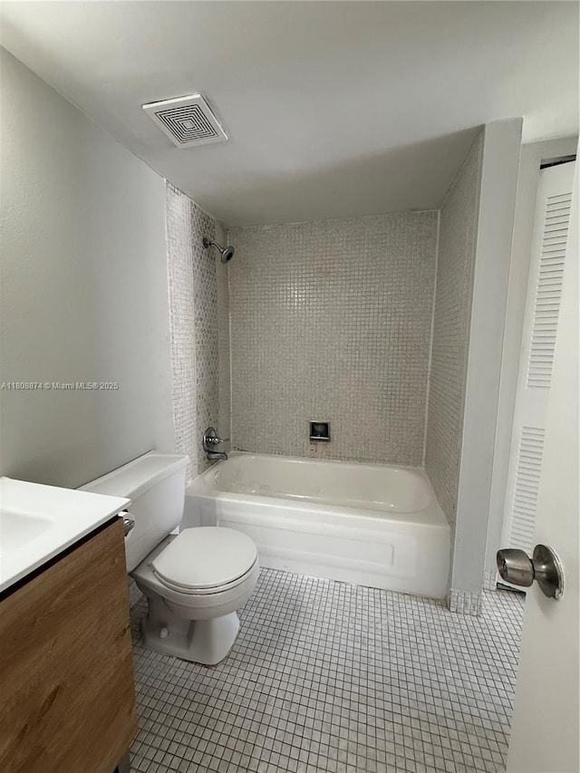 4705 NW 7th St Unit 203-7, Miami, FL 33126 - full bath with toilet, tile patterned floors, vanity, and  shower combination