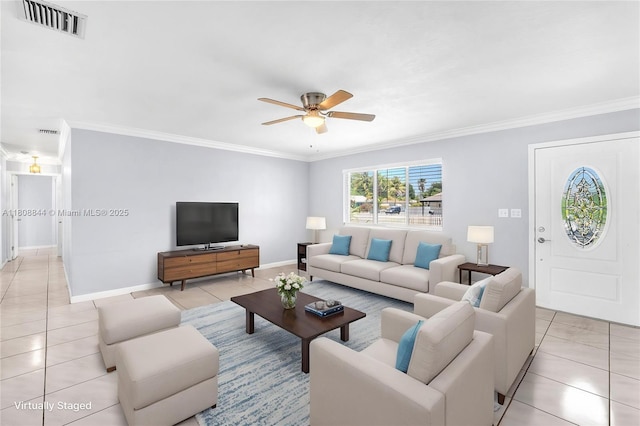 1520 N 25th Ave, Hollywood, FL 33020 - living area with light tile patterned flooring, ornamental molding, a ceiling fan, and baseboards