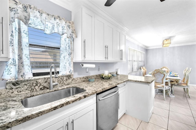 1520 N 25th Ave, Hollywood, FL 33020 - kitchen featuring stainless steel dishwasher, a sink, white cabinets, ornamental molding, and light tile patterned flooring