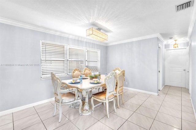 1520 N 25th Ave, Hollywood, FL 33020 - dining area featuring crown molding, light tile patterned floors, and baseboards