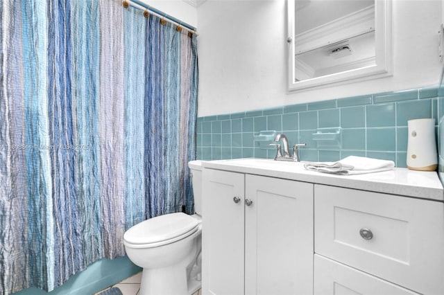 1520 N 25th Ave, Hollywood, FL 33020 - bathroom with vanity, toilet, tile walls, and wainscoting