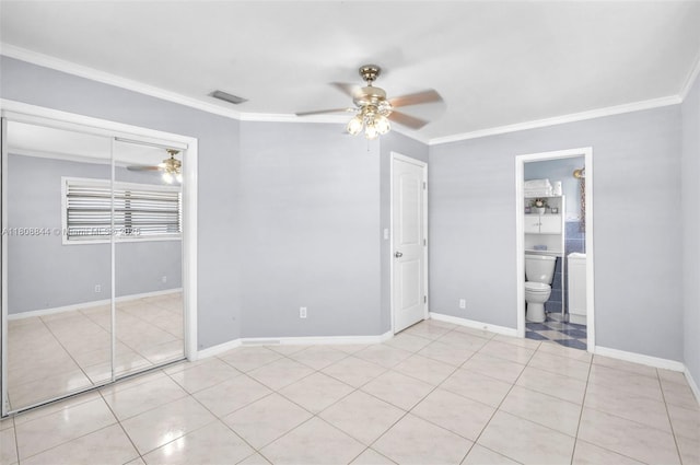 1520 N 25th Ave, Hollywood, FL 33020 - unfurnished bedroom featuring crown molding, light tile patterned flooring, baseboards, ceiling fan, and a closet