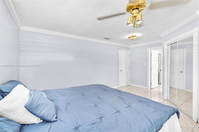 1520 N 25th Ave, Hollywood, FL 33020 - bedroom with crown molding, tile patterned flooring, baseboards, and ceiling fan