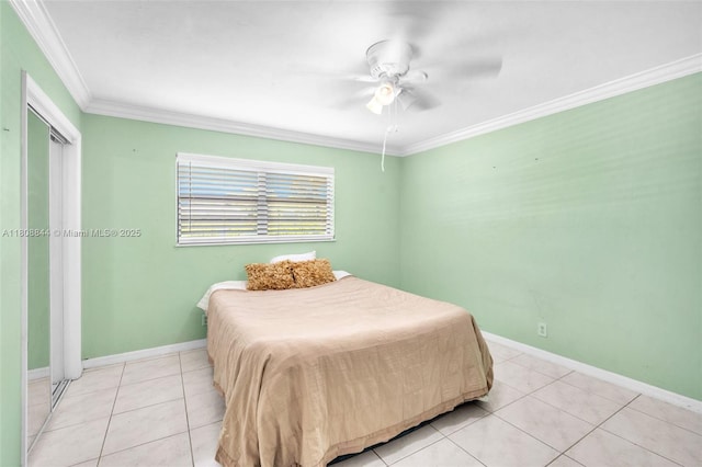1520 N 25th Ave, Hollywood, FL 33020 - bedroom with ornamental molding, light tile patterned floors, baseboards, and ceiling fan