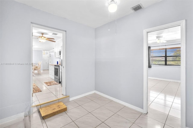 1520 N 25th Ave, Hollywood, FL 33020 - corridor with light tile patterned floors and baseboards