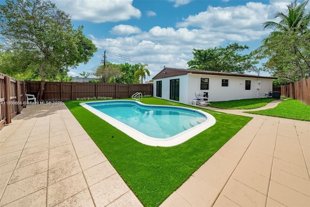 2447 Fletcher St, Hollywood, FL 33020 - view of pool featuring a patio area and central AC